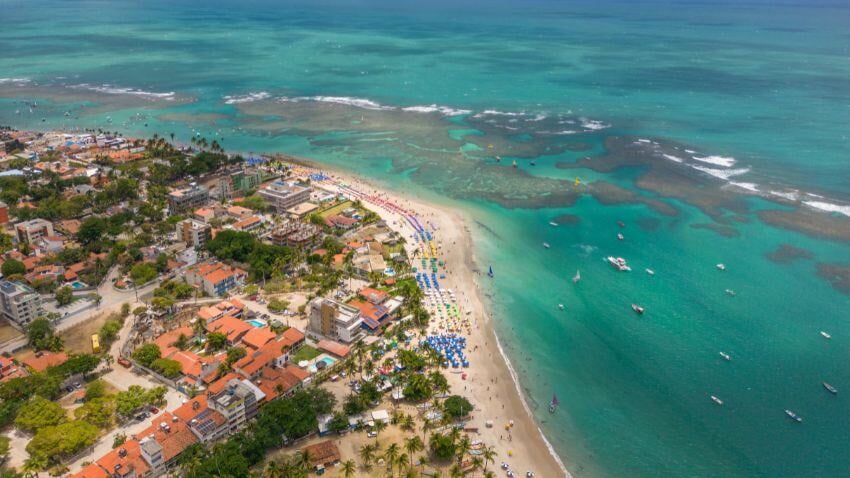 Porto de Galinhas, in Pernambuco, boasts crystal-clear natural pools, white sandy beaches, and a laid-back vibe. With great tourism infrastructure, lively nightlife, and family-friendly waters, it’s a top spot for expats and visitors alike