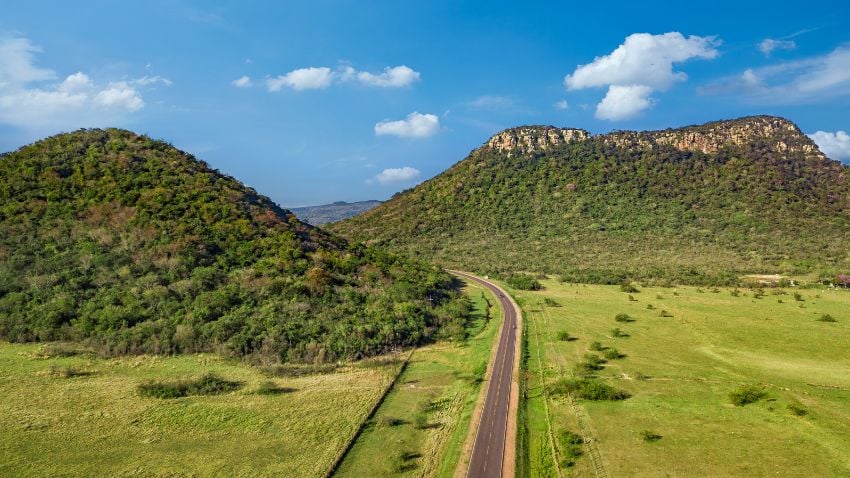 Aerial view of the Cerro Jhú (Cerro Negro). This hills are one of the visual landmarks of the city of Paraguari in Paraguay - Paraguay is emerging as an excellent retirement destination for expats, offering a warm climate, low prices, and a welcoming culture. Known for its laid-back lifestyle, Paraguay provides retirees with a peaceful environment to enjoy their golden years. Major cities like Asuncion and Encarnacion offer affordable accommodation options, with apartment prices significantly lower than in neighbouring countries, allowing retirees to maintain a comfortable budget. The relocation process is relatively straightforward, with multiple residency options available to suit individual needs. Expats can settle into their new home with ease, thanks to the country's growing internet and infrastructure coverage that facilitates modern conveniences. Whether you're looking for quiet places or vibrant social activities, Paraguay's varied regions and destinations provide plenty of opportunities to explore and integrate into the local community.