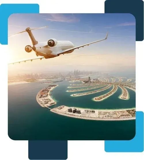 Private jet flying over the Palm Jumeirah in Dubai, showcasing the exclusive lifestyle and elite access of Flying Private members.