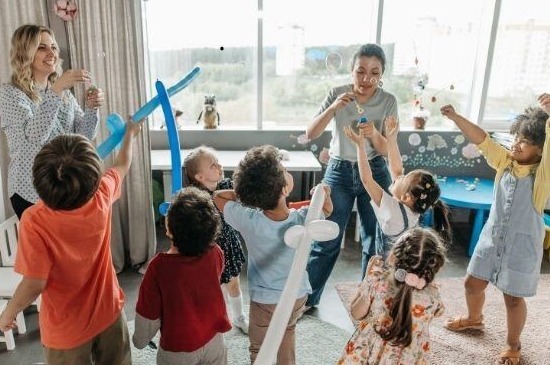 Children playing with balloons