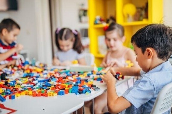 Kids playing with Lego blocks