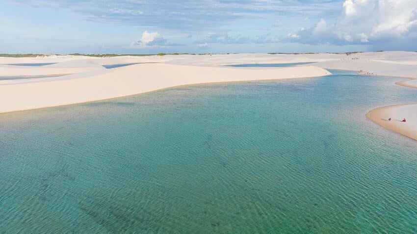 Lençóis Maranhenses is so surreal it feels like a dream. Imagine a vast desert of white dunes dotted with turquoise lagoons that appear after seasonal rains. This unforgettable landscape is truly one of a kind