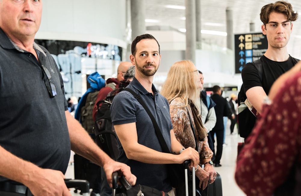 Mikkel and the group on the airport preparing to travel-1