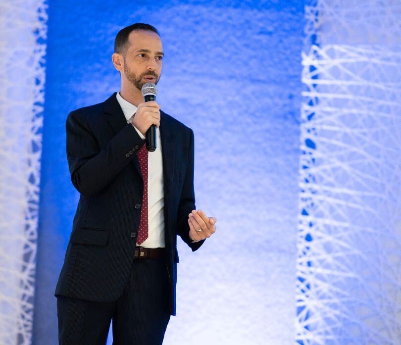Mikkel speaking at the Conference