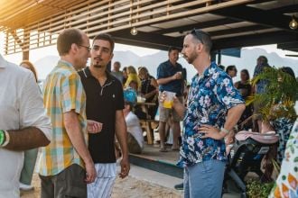 Mikkel talking with friends at birthday party