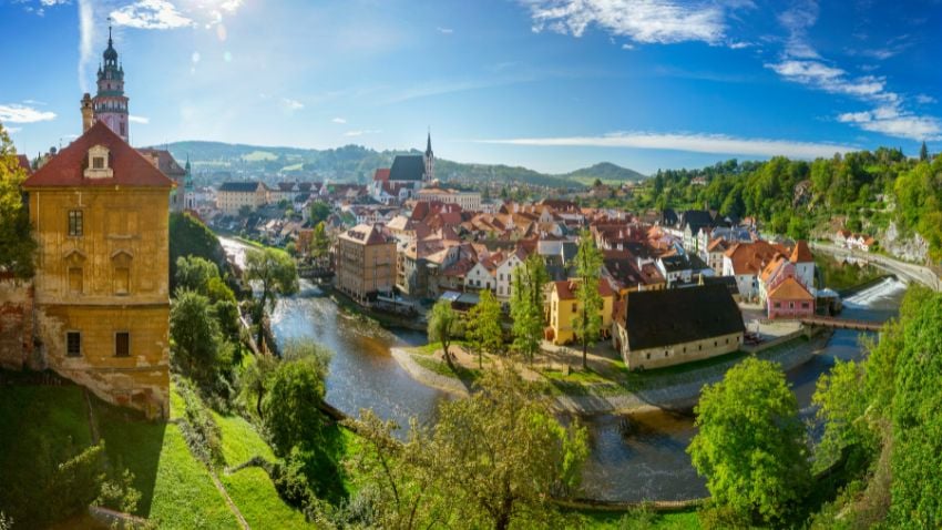 Panoramic view of Cesky Krumlov, Czech Republic - For digital nomads seeking a harmonious blend of work and leisure, the Czech Republic's rich history, picturesque nature, and modern amenities make it an attractive destination. The combination of excellent internet connections, coworking spaces, and a welcoming attitude towards employees working abroad ensures that digital nomads can maintain their remote work effectively. Moreover, the country's visa requirements are relatively hassle-free for freelancers and location-independent workers, making it easier to enjoy a long-term stay while exploring the country's beautiful landscapes and charming architecture. The Czech Republic provides an ideal backdrop for digital nomads looking to elevate their work-life balance and immerse themselves in a foreign culture.