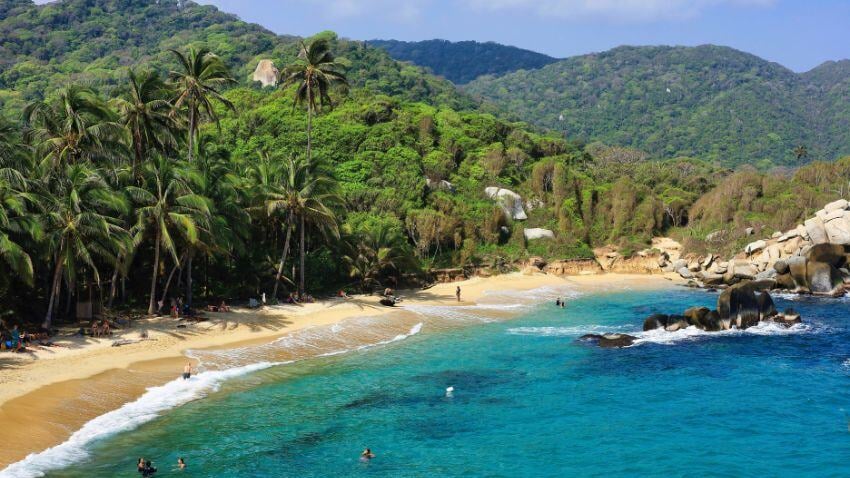 Tayrona National Park on Colombia’s Caribbean coast combines lush rainforests, beautiful beaches, and ancient Tayrona ruins, making it ideal for nature and history lovers alike