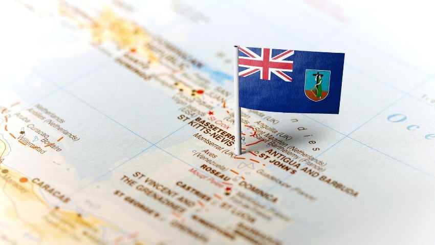 The flag of Montserrat pinned on the map
