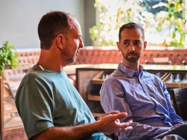 Mikkel Thorup having a conversation with a friend