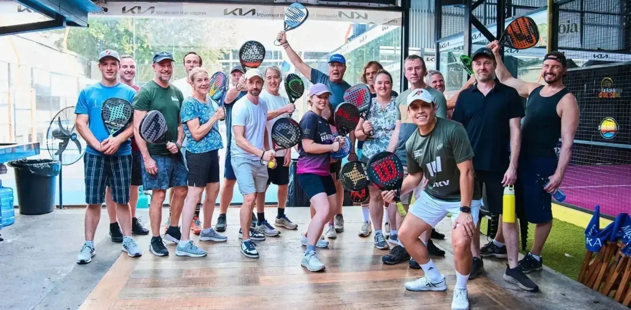 Group of people playing padel during the September Paraguay tour, 2025