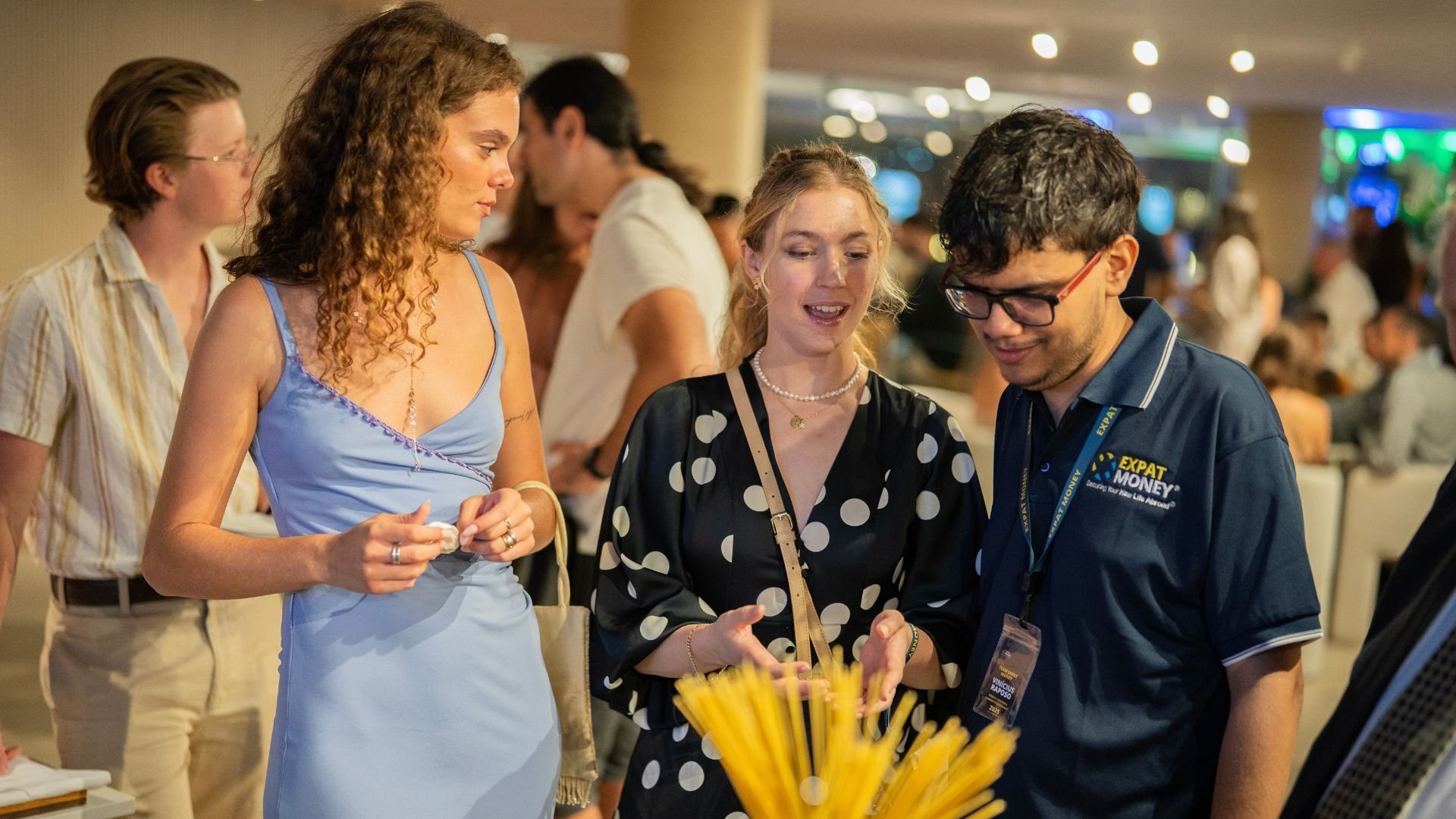 Staff talking with the guests.