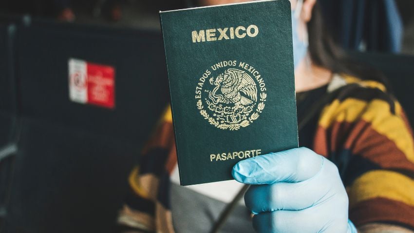 Woman in gloves holding a Mexican Passport- Mexico boasts a plethora of nomad-friendly destinations and it's a hotspot for digital nomads