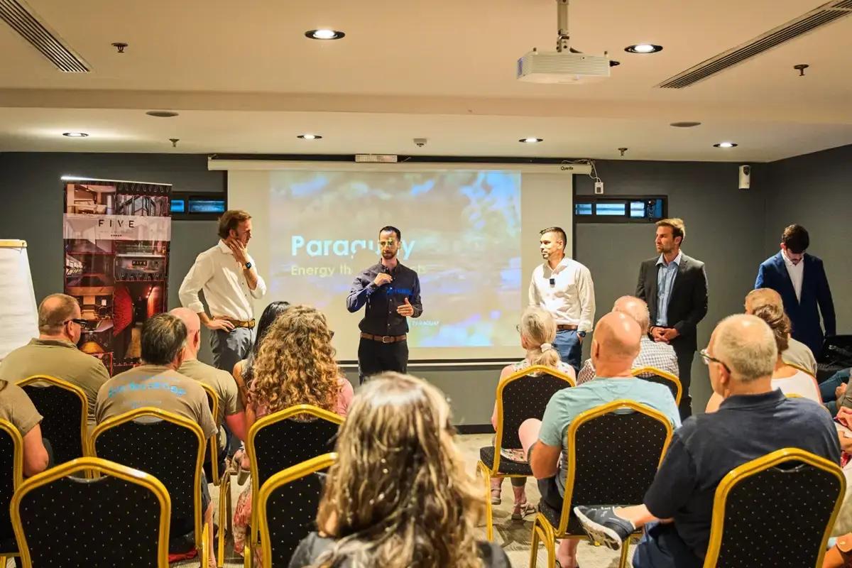 Mikkel and speakears lecturing on Expat Exploration & Investment Tour Paraguay