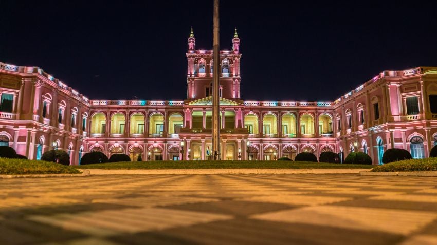 View on illuminated pink presidential palace in Asuncion, Paraguay at night